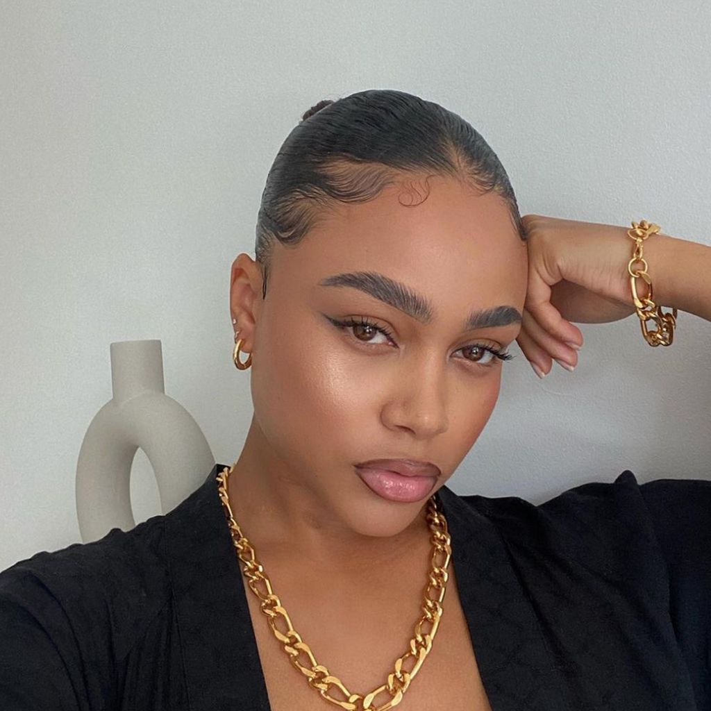 Meticulously Shaped Baby Hairs on Sleek Hair