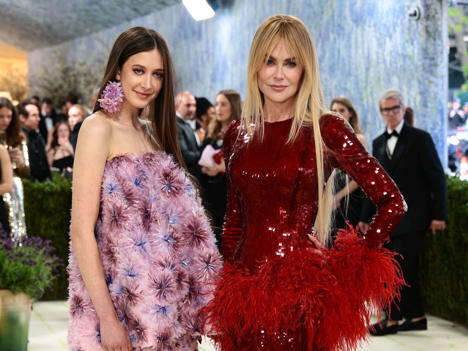 Red Sequined Gown with Feathered Hem for a Glamorous Gala Entrance Red Sequined Gown with Feathered Hem for a Glamorous Gala Entrance — Charity Gala Outfits