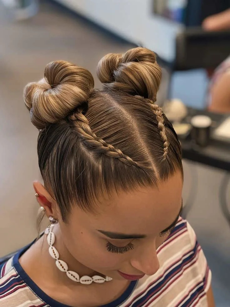 Double Buns With Face-Framing Braids Double Buns With Face-Framing Braids — Dance Competition Hairstyles