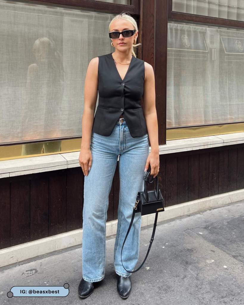 Sleek Black Vest with Light Wash Jeans — Vest Outfits