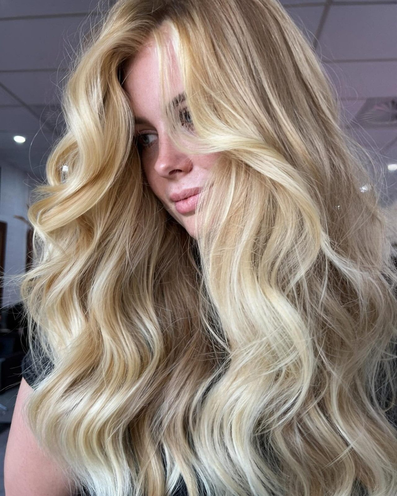 Creamy Butter Blonde With Curtain Bangs Creamy Butter Blonde With Curtain Bangs