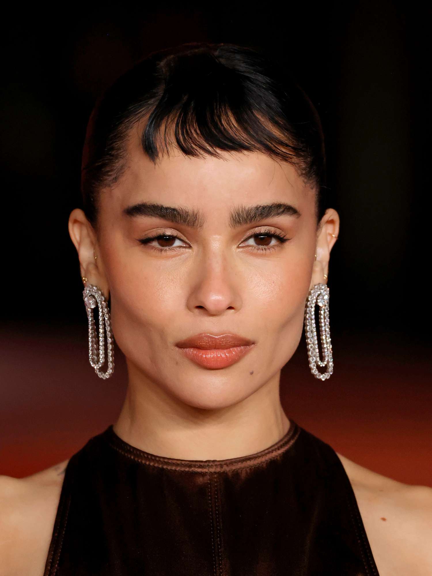 Sleeveless Top with Statement Silver Earrings and Baby Bangs Sleeveless Top with Statement Silver Earrings and Baby Bangs