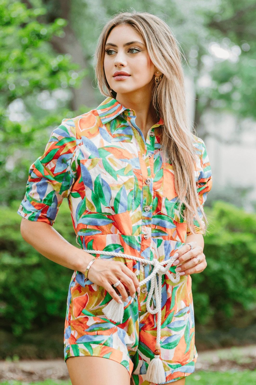 Vibrant Statement: Abstract Print Button-Front Romper — Rompers