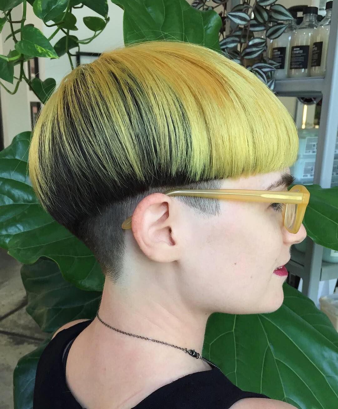 Vibrant Yellow Bowl Cut With Dark Roots Vibrant Yellow Bowl Cut With Dark Roots
