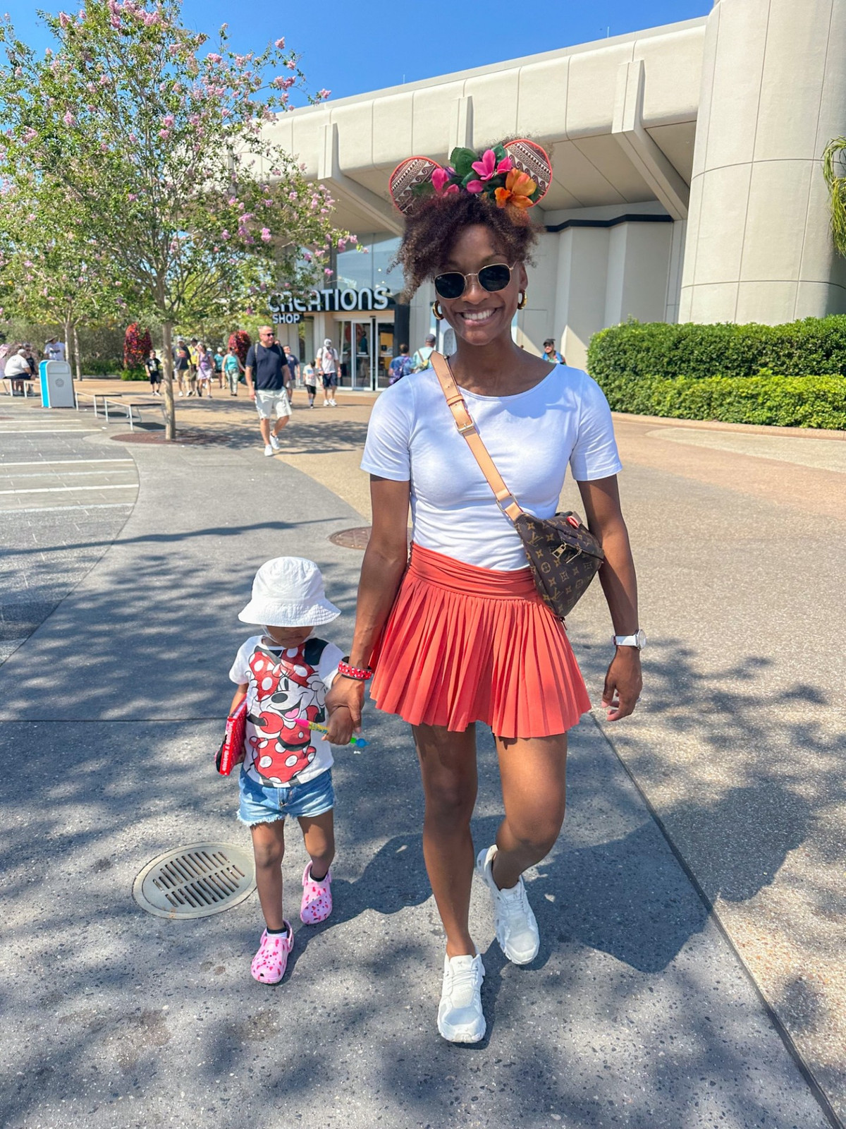 Playful Pleated Skirt with Casual Top — Theme Park Outfits