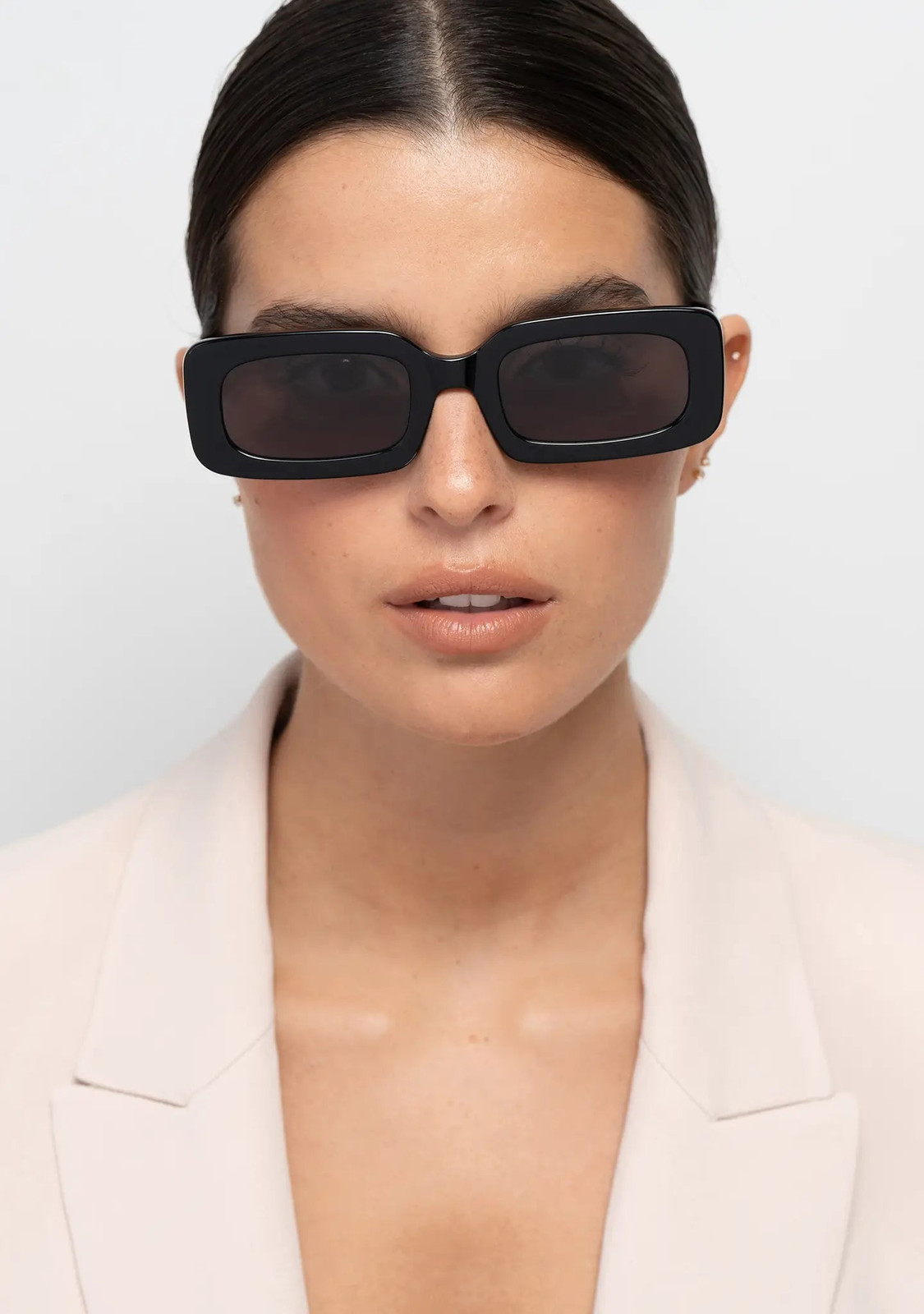 Chunky Rectangular Black Sunglasses with a Blazer — Sunglasses for Round Face