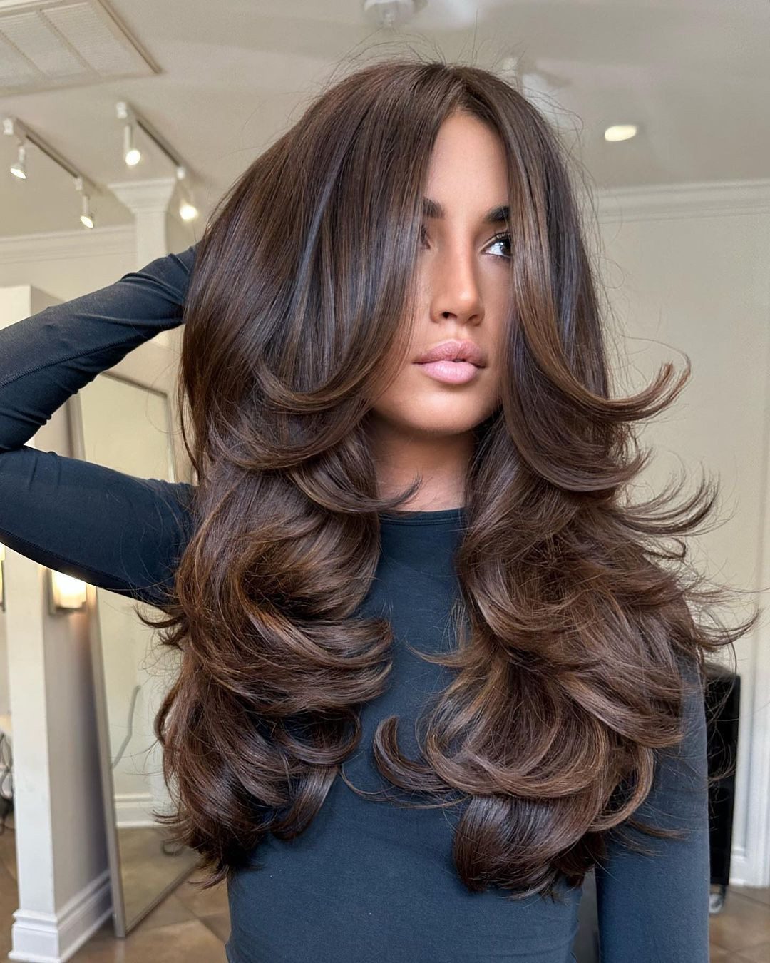 Mid-Back Layers With Voluminous Blowout — Brunette Hair Colors