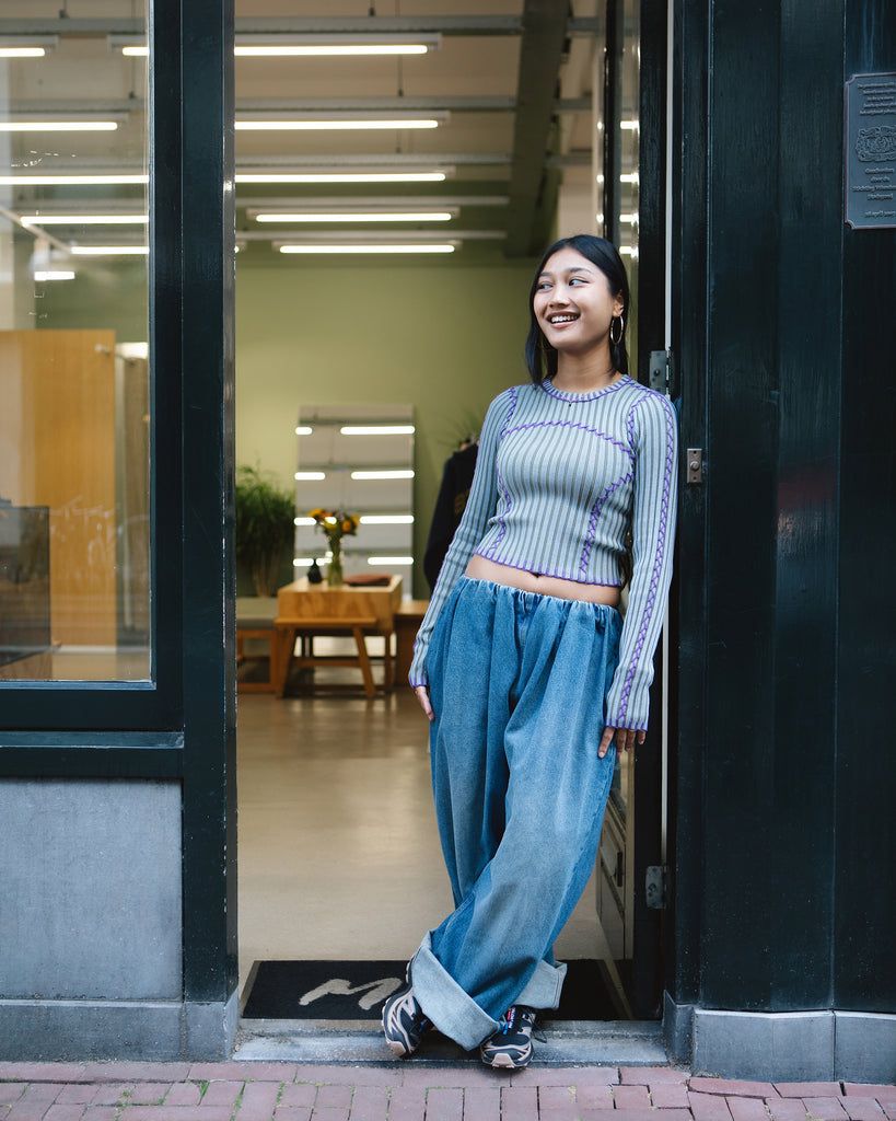 Streetwear Staple: Baggy Jeans and Ribbed Top with Blue and Black Salomon XT-6 Streetwear Staple: Baggy Jeans and Ribbed Top with Blue and Black Salomon XT-6 — Salomon Outfits
