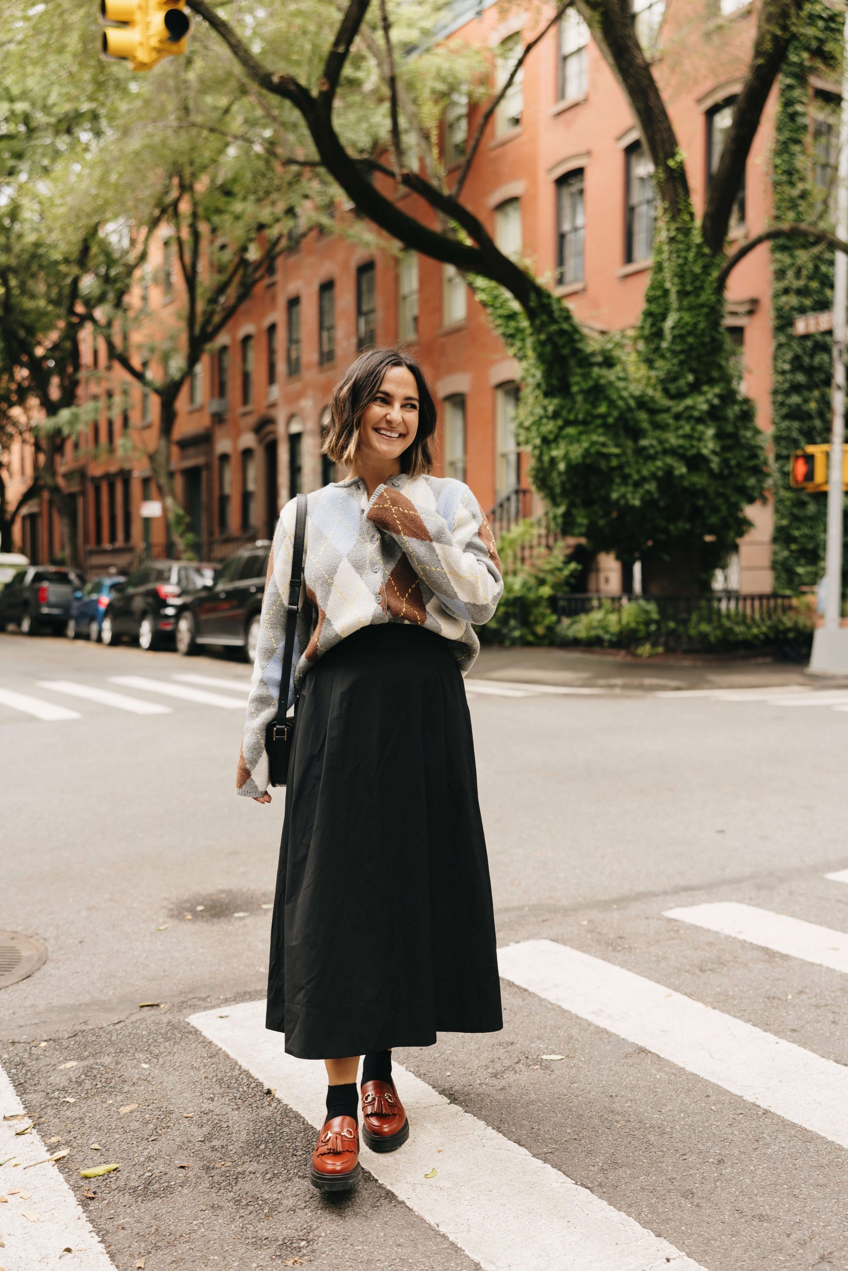 Red Chunky Loafers Paired with an Argyle Sweater and A-Line Skirt — Loafer Outfits
