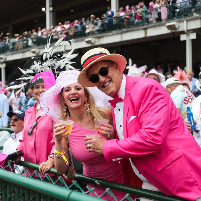 Man in Vibrant Pink Suit with Bow Tie and Straw Hat — Kentucky Derby Outfits