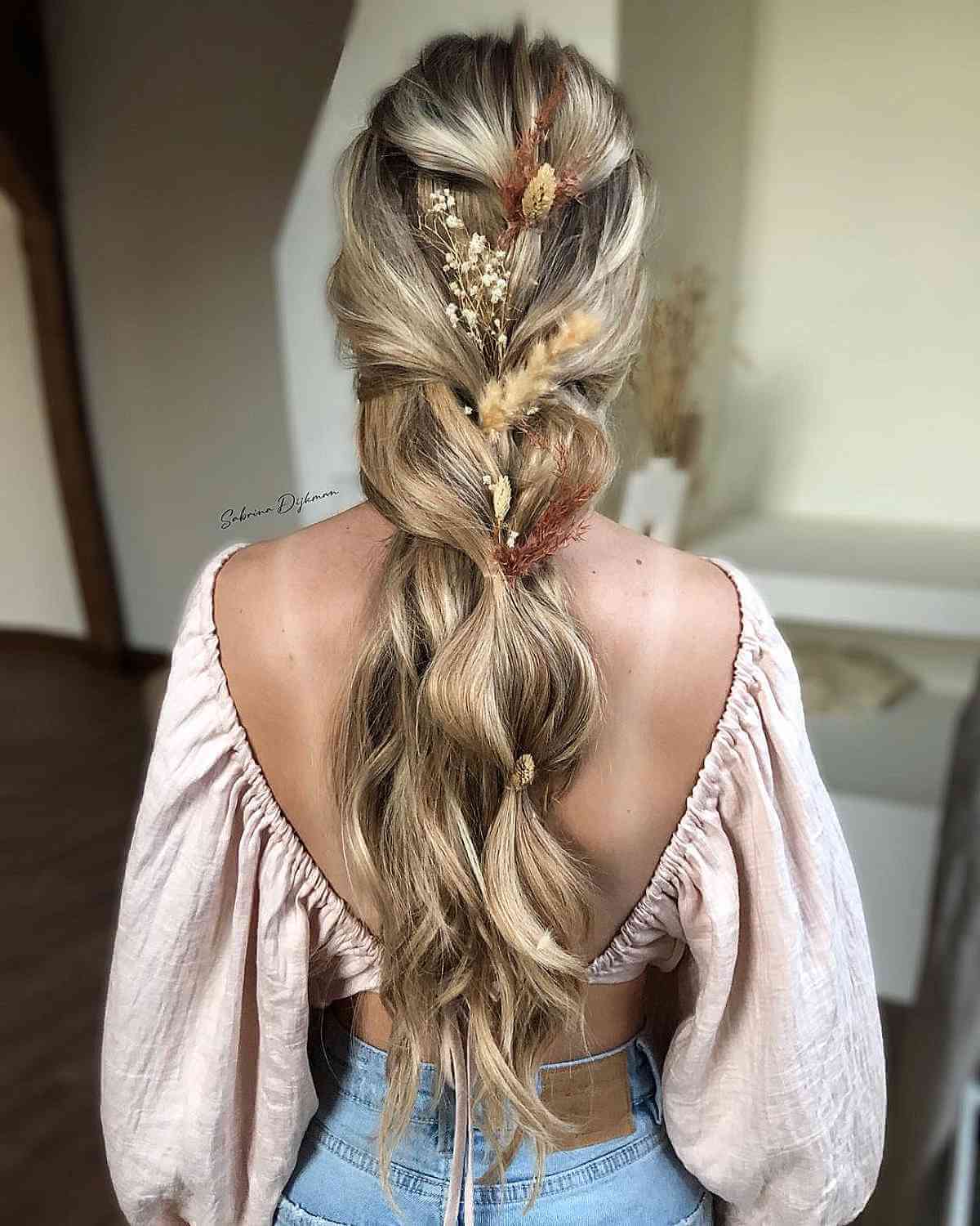 Mid-Back Loose Braid With Florals Mid-Back Loose Braid With Florals — Boho Hairstyles