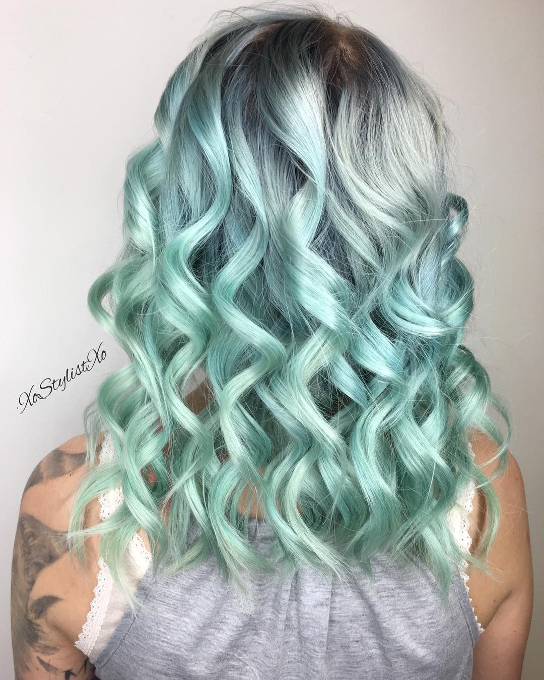 Mid-Back Waves With Darker Roots — Pastel Green Hair
