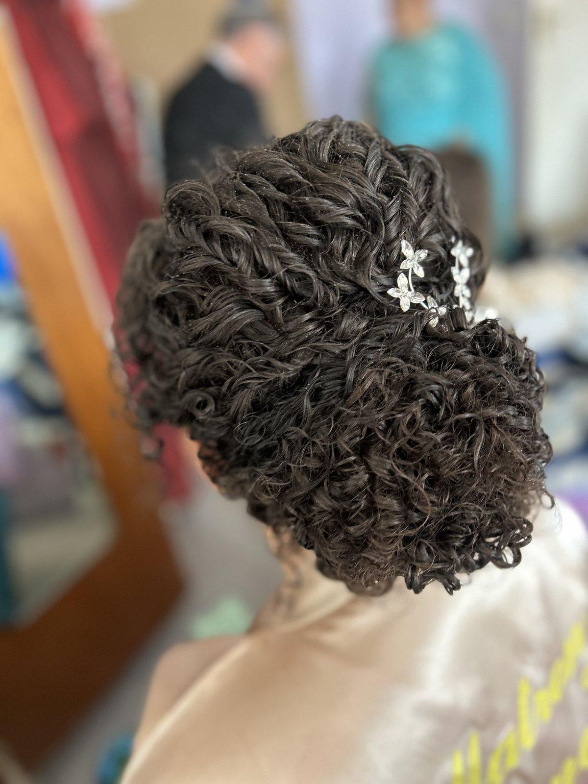 Light Blonde Twisted Updo With Pearl Accessory Light Blonde Twisted Updo With Pearl Accessory — Mother of the Bride Hairstyles