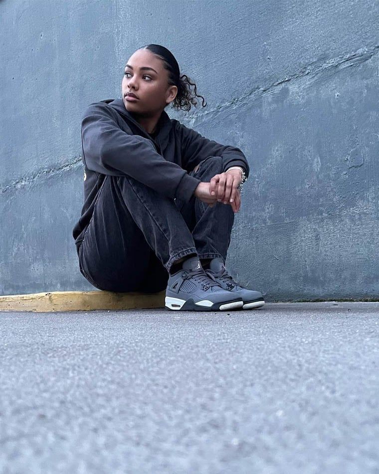 Understated Ease: Grey Jordan 4s with Black Jeans and Hoodie Understated Ease: Grey Jordan 4s with Black Jeans and Hoodie — Jordan 4 Outfits