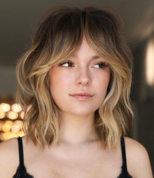 Honey Blonde Shag With Curtain Bangs — Collarbone Length Hair