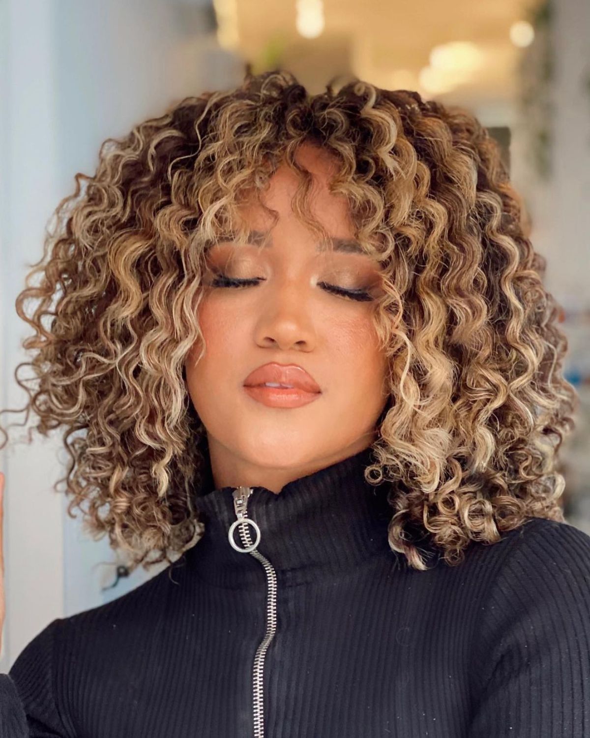 Honey Blonde Bob With Full Bangs — Curly Bob