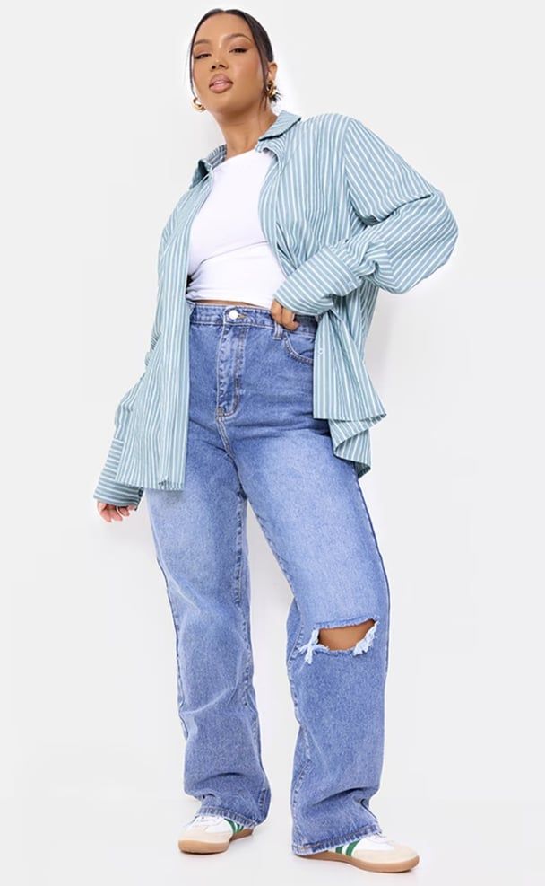 Striped Shirt Layered Over Ripped Jeans