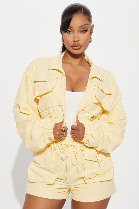 Pale Yellow Windbreaker with Utility Pockets Pale Yellow Windbreaker with Utility Pockets — Windbreaker Outfits