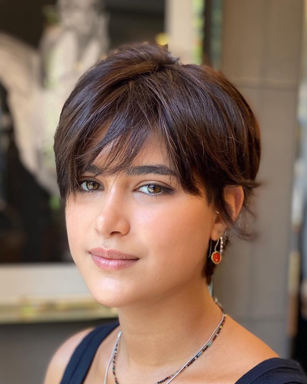 Pixie Cut With Side-Swept Bangs Pixie Cut With Side-Swept Bangs — Haircuts for Thick Hair