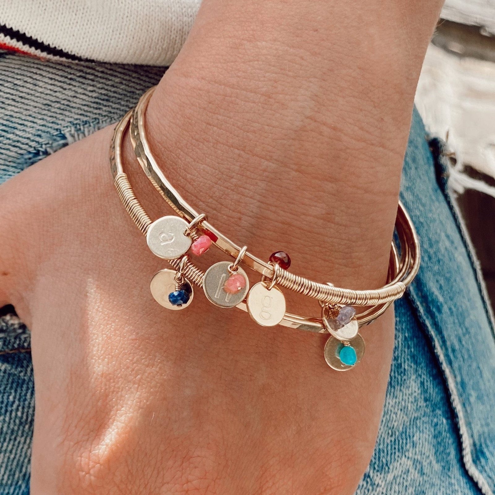 Casual Chic: Gold Charm Bracelets with Initial Discs Casual Chic: Gold Charm Bracelets with Initial Discs