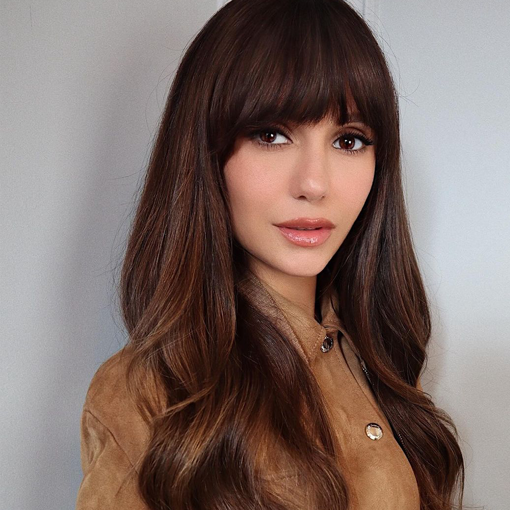 Textured Jacket and Blunt Bangs: Chic Casual Layering