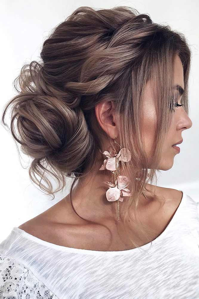 Fine Wavy Ash Blonde Bun with Side Bangs — Messy Low Bun