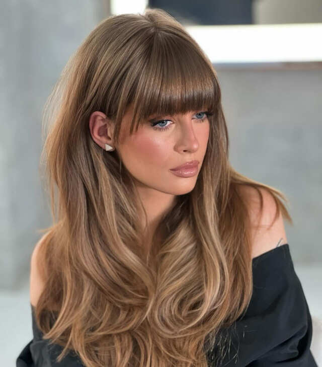 Caramel Blonde Blowout With Full Bangs — Long Hair with Bangs