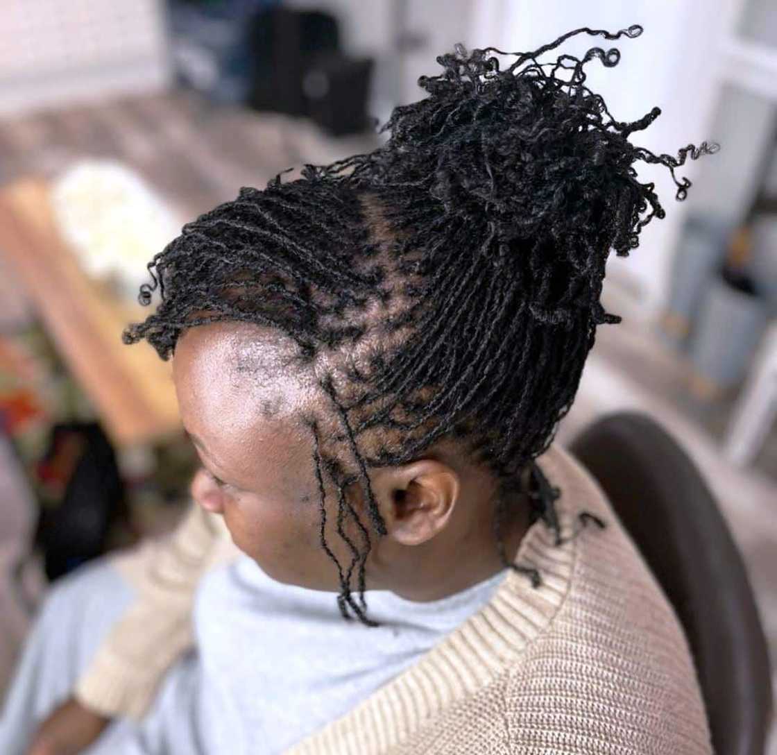 Black Sister Locs in a High Bun Black Sister Locs in a High Bun