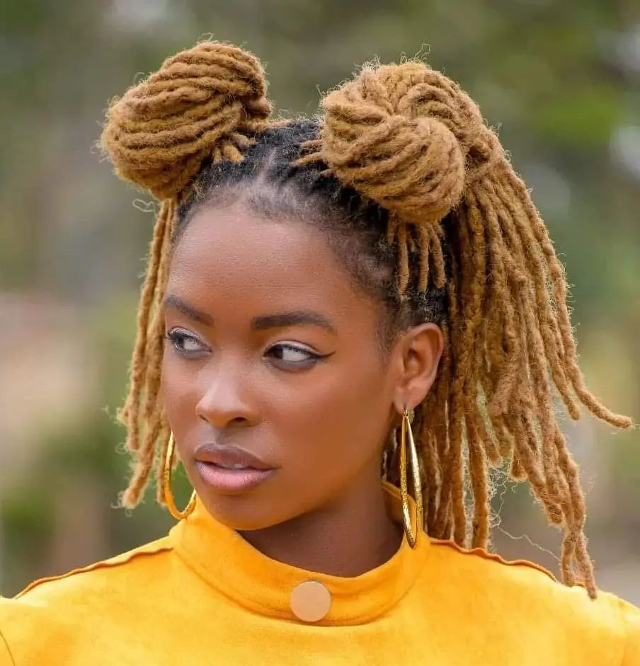 Light Brown Locs in Playful Space Buns Light Brown Locs in Playful Space Buns — Blonde Locs