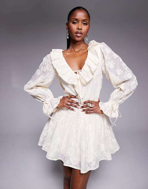 Cream Lace Mini Dress with Ruffled V-Neck and Balloon Sleeves Cream Lace Mini Dress with Ruffled V-Neck and Balloon Sleeves — Ruffle Dresses