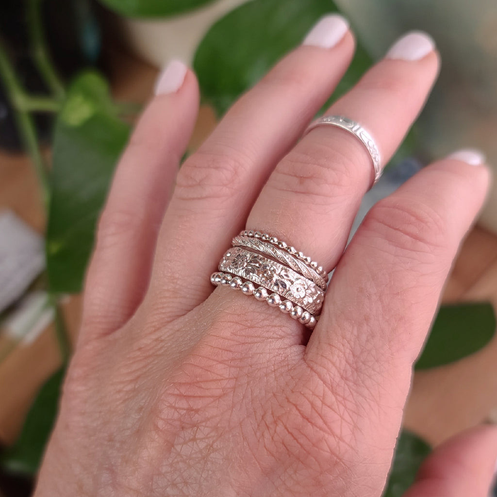 Intricate Floral Silver Ring Stack