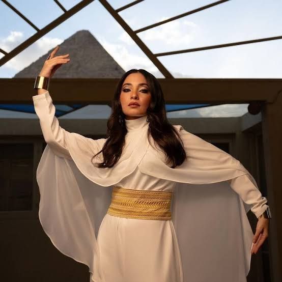Elegant White Flowing Dress with Cape Sleeves and Gold Belt Elegant White Flowing Dress with Cape Sleeves and Gold Belt — Egypt Outfits