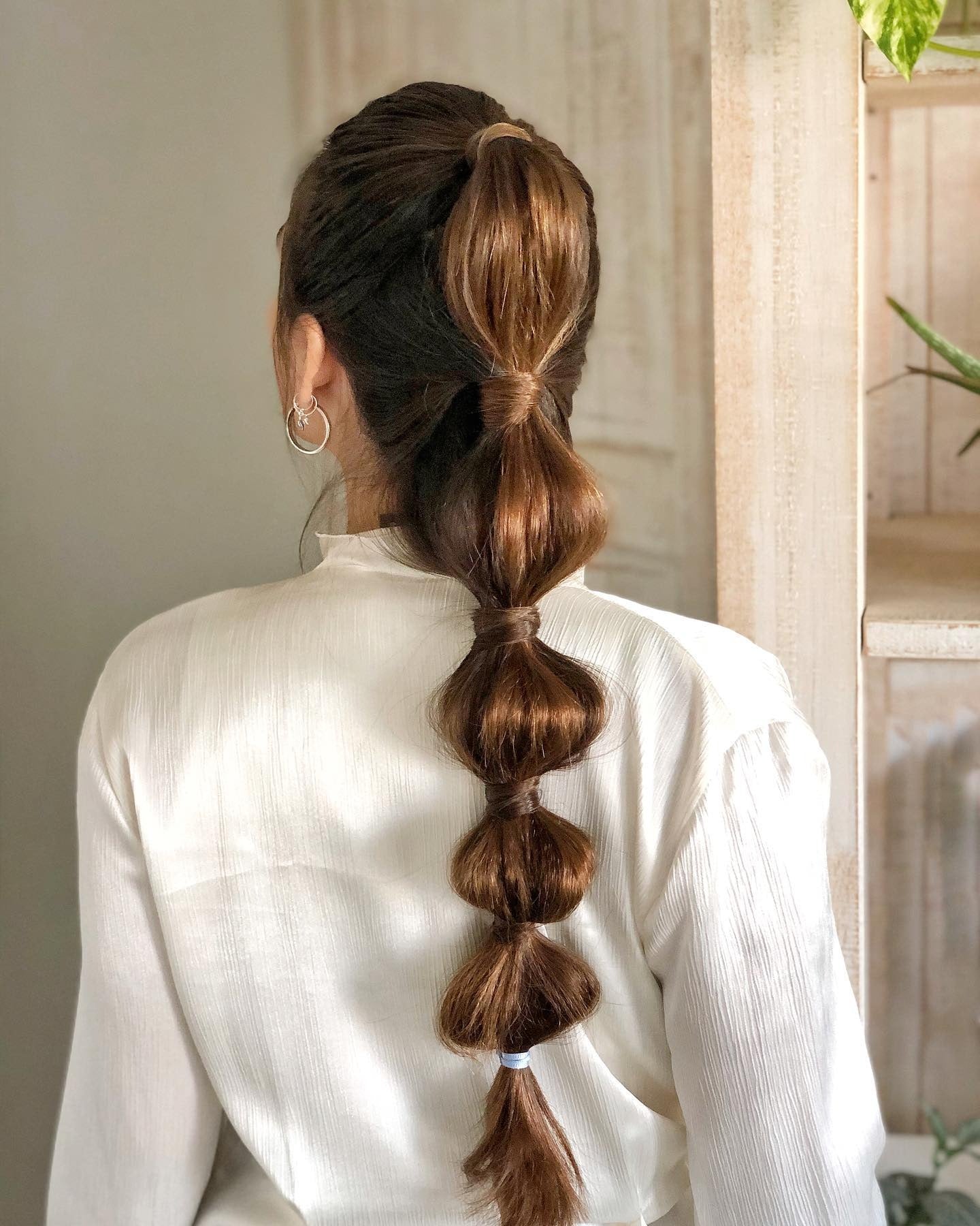 Medium Brown Bubble Ponytail with Blonde Highlights Medium Brown Bubble Ponytail with Blonde Highlights