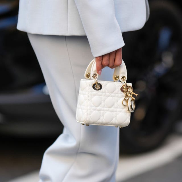 Quilted White Leather Bag with Sharp Blue Suit — Designer Bags