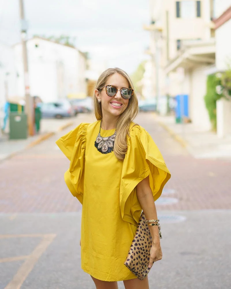 Mustard Yellow Dress with Voluminous Sleeves and Leopard Clutch — Clutch Outfits