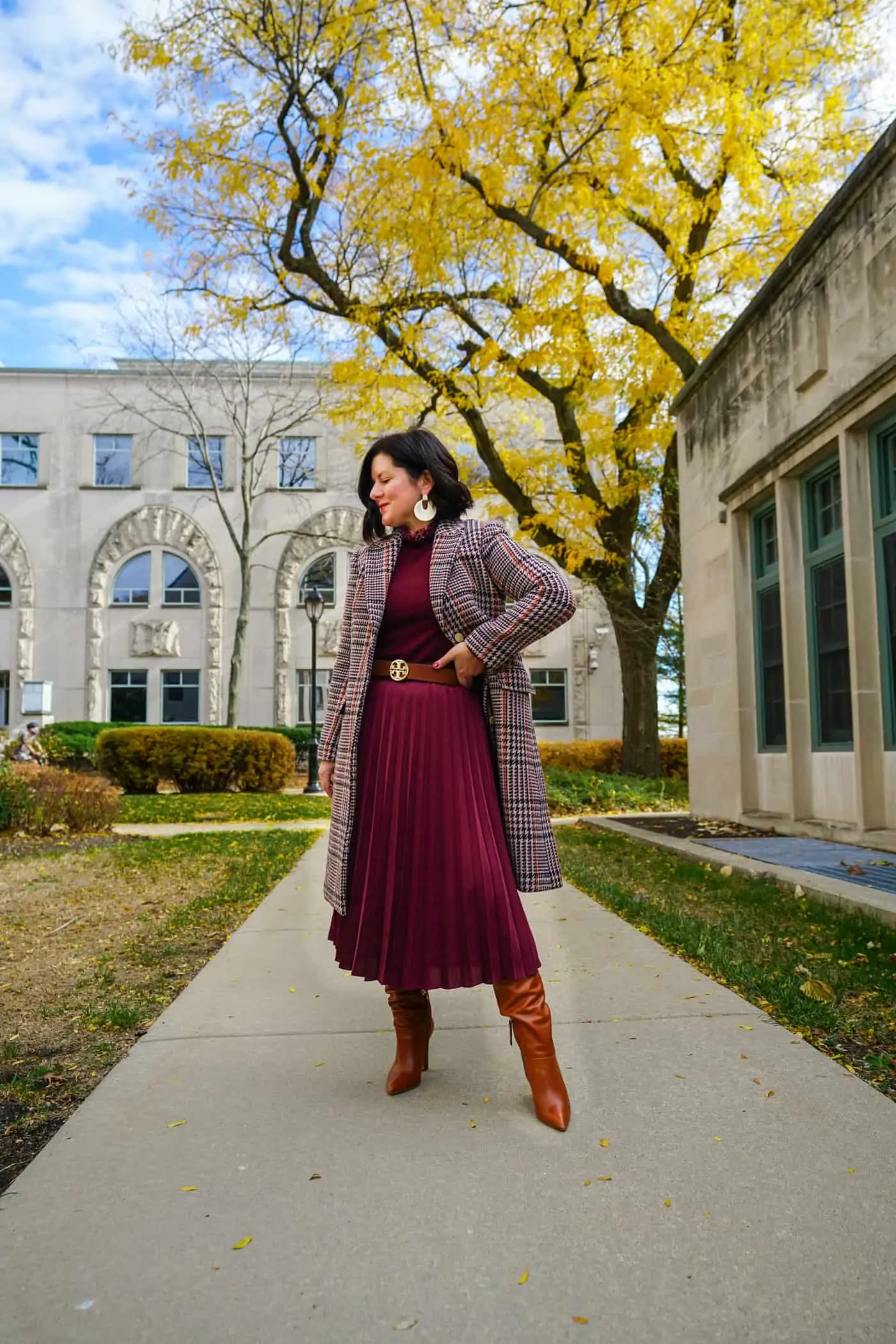 Autumnal Elegance: Burgundy Pleats with Plaid and Knee-High Boots Autumnal Elegance: Burgundy Pleats with Plaid and Knee-High Boots — Pleated Skirts