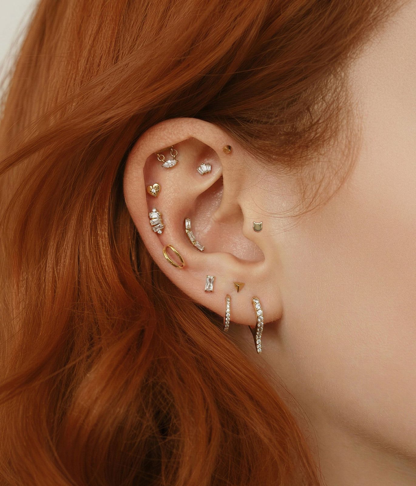 Bold and Dense Gold and Silver Ear Piercing Collection Bold and Dense Gold and Silver Ear Piercing Collection — Ear Piercing Ideas