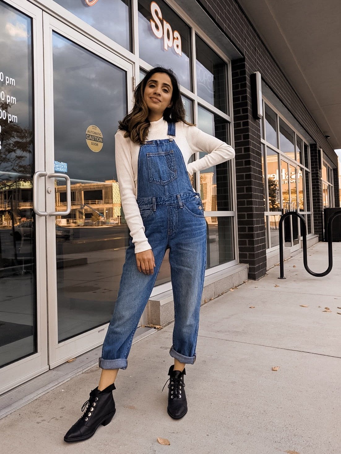 Blue Denim Overalls with Cream Ribbed Top and Lace-Up Boots Blue Denim Overalls with Cream Ribbed Top and Lace-Up Boots