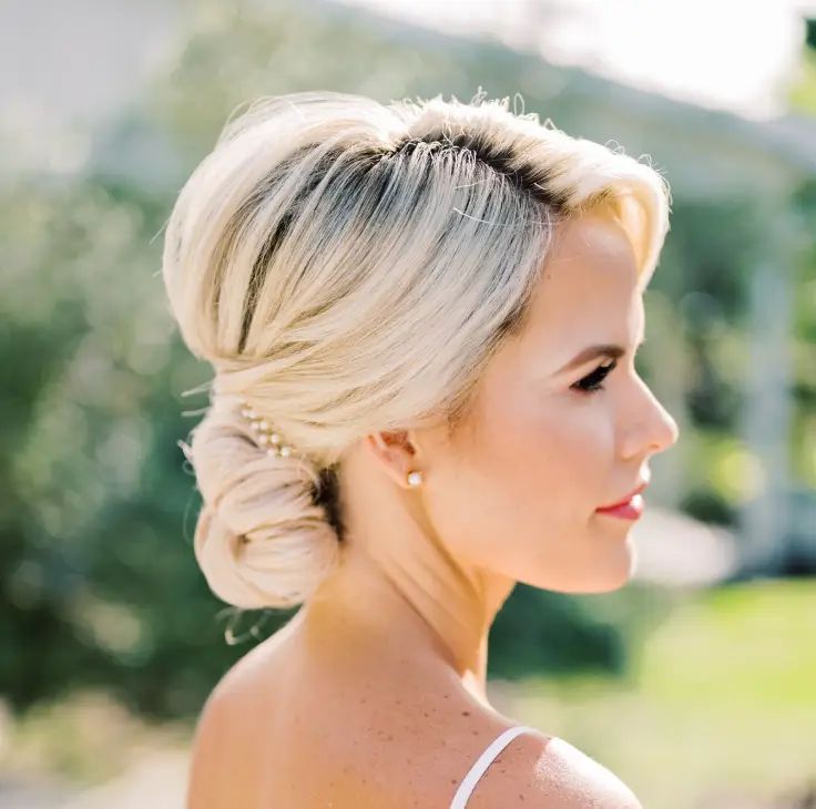 Visual Idea — With Soft Waves Swept Back From The Face — Hairstyles for Heart Shaped Faces
