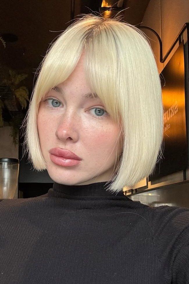 Creamy Platinum Bob With Full Bangs Creamy Platinum Bob With Full Bangs — Blunt Bob