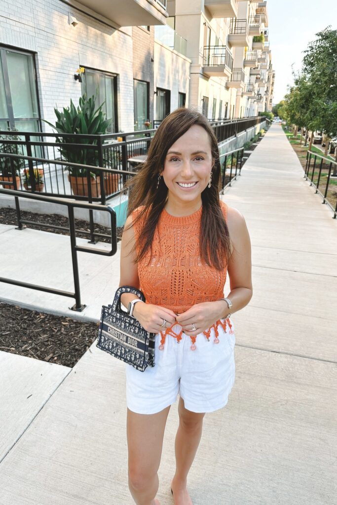 Orange Crochet Top with Fringe and White Shorts for a Summer Statement — Tank Top Outfits