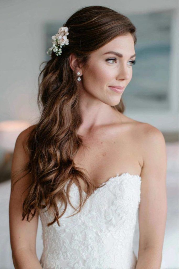 Loose Waves with Side Bangs and Delicate Flower — Wedding Hairstyles with Flowers