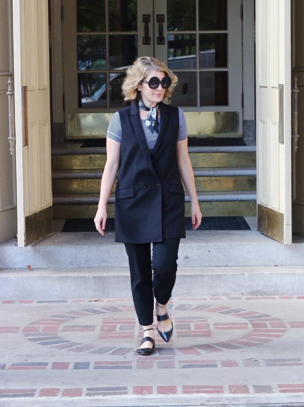 Striped Tee and Vest Combo with Black Trousers — First Day of Work Outfits