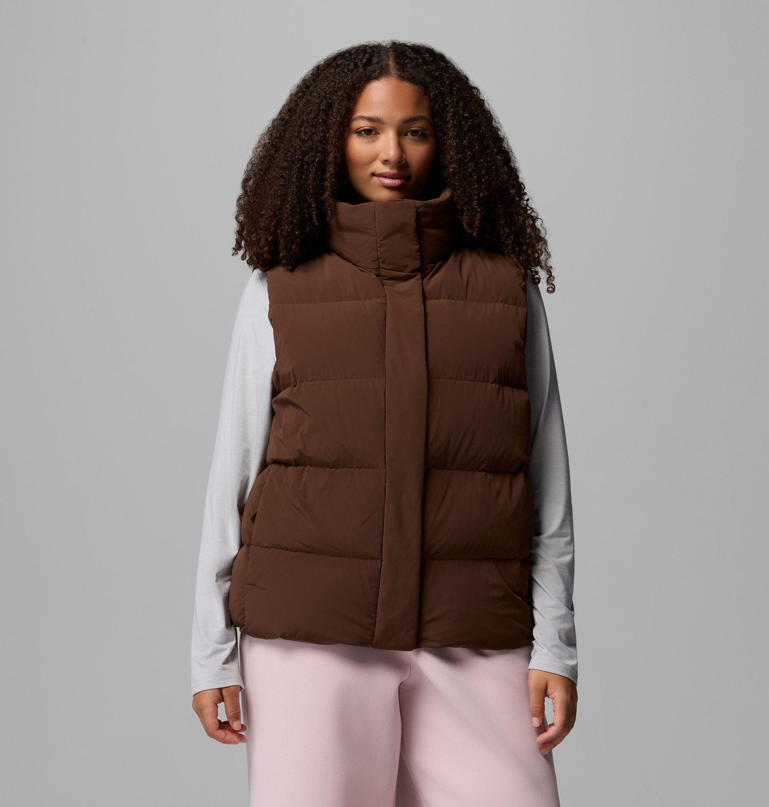 Brown Puffer Vest with High Collar for Outdoor Appeal Brown Puffer Vest with High Collar for Outdoor Appeal — Vests