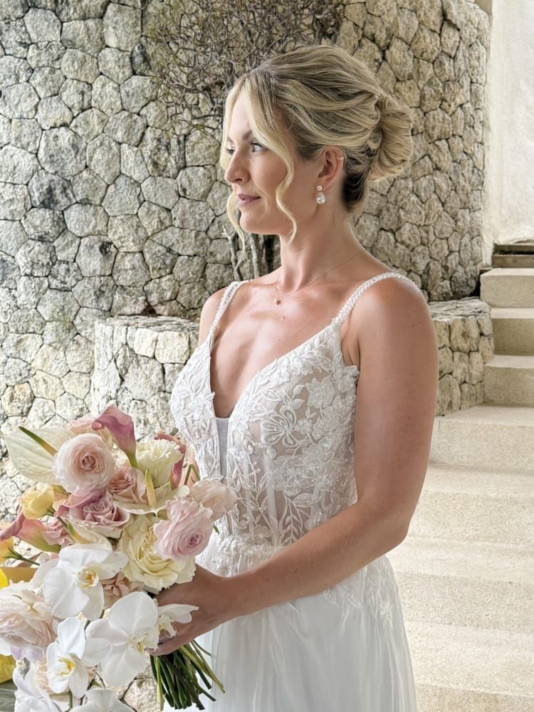 Neat Blonde Updo With Face Framing Wisps Neat Blonde Updo With Face Framing Wisps — Boho Wedding Hair