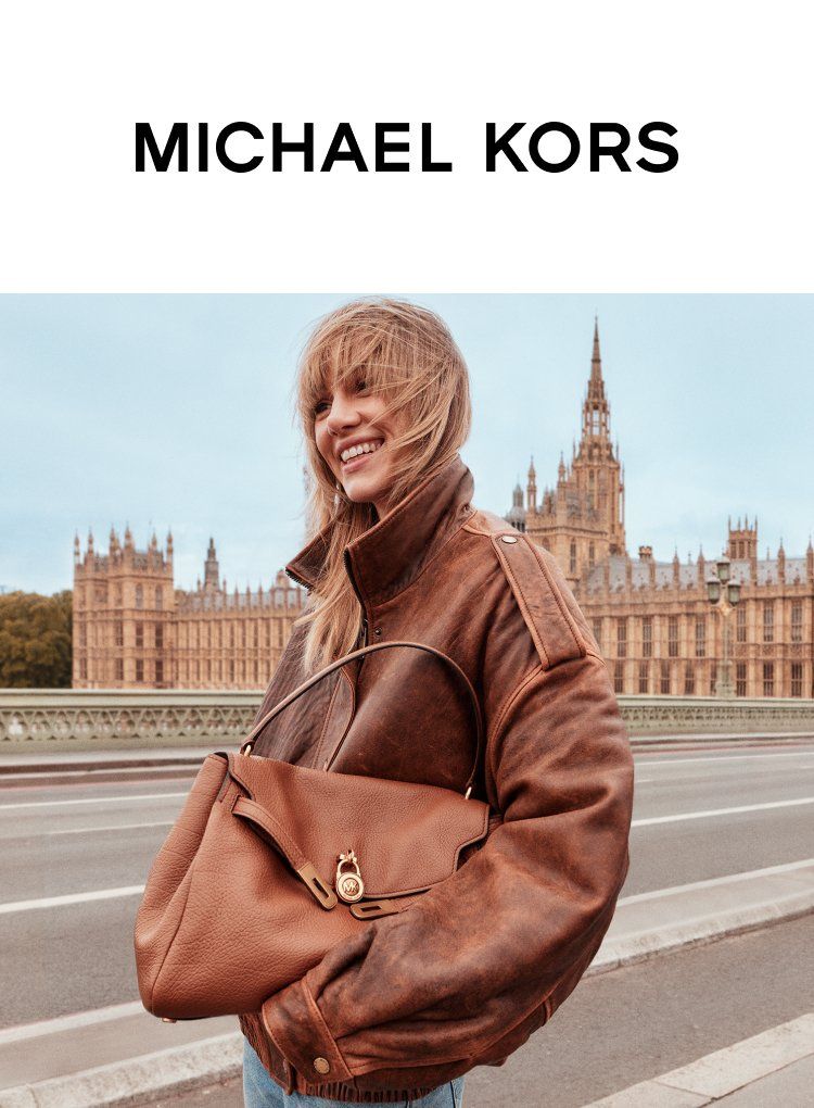Cityscape Backdrop: Brown Leather Jacket and Tan Michael Kors Bag — Michael Kors Bag Outfits