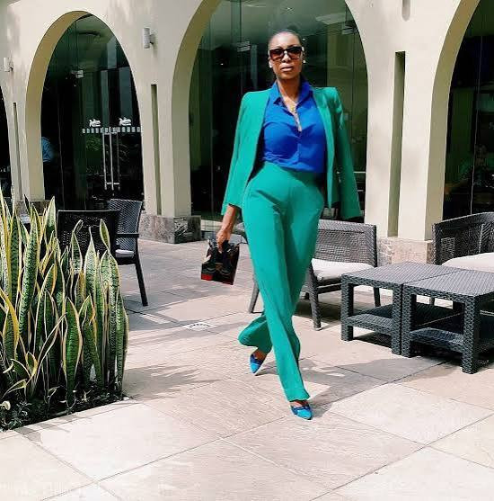 Vibrant Teal Pantsuit with Royal Blue Accents Vibrant Teal Pantsuit with Royal Blue Accents — Networking Event Outfits