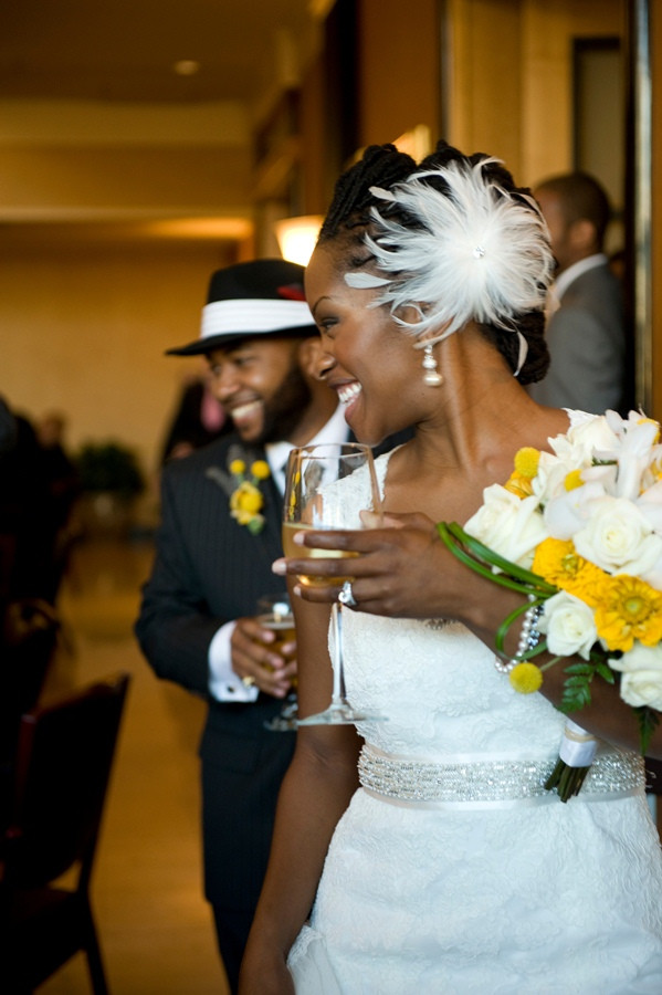 Elegant Loc Updo With Feather Hairpiece Elegant Loc Updo With Feather Hairpiece — Loc Styles for Wedding