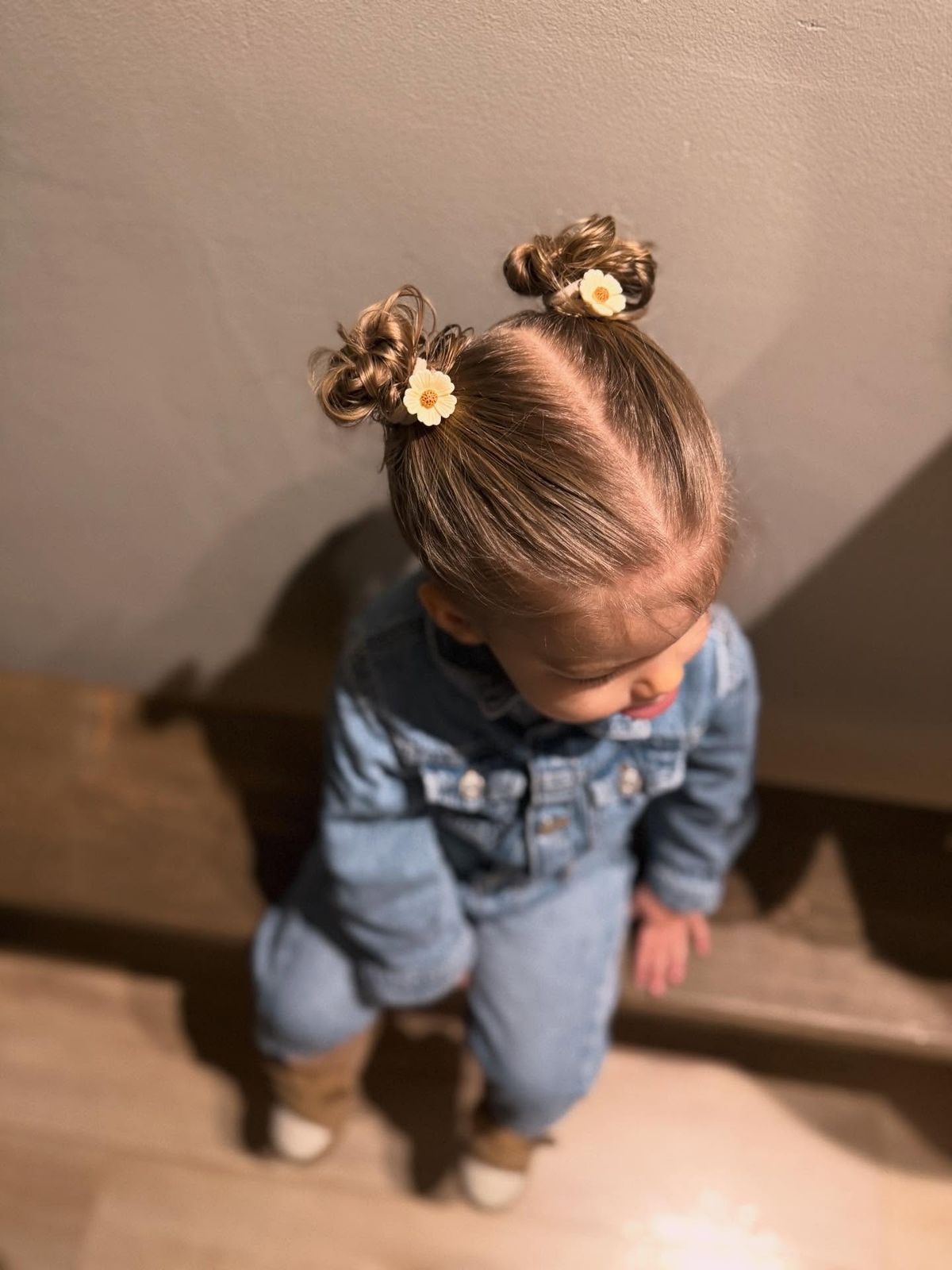 Small Messy Buns with Flower Accents Small Messy Buns with Flower Accents — Toddler Girl Hairstyles