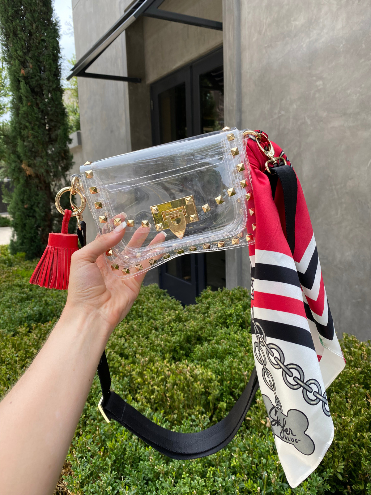 Edgy Embellishments: Studded Clear Bag with Tassel — Clear Bag Outfits
